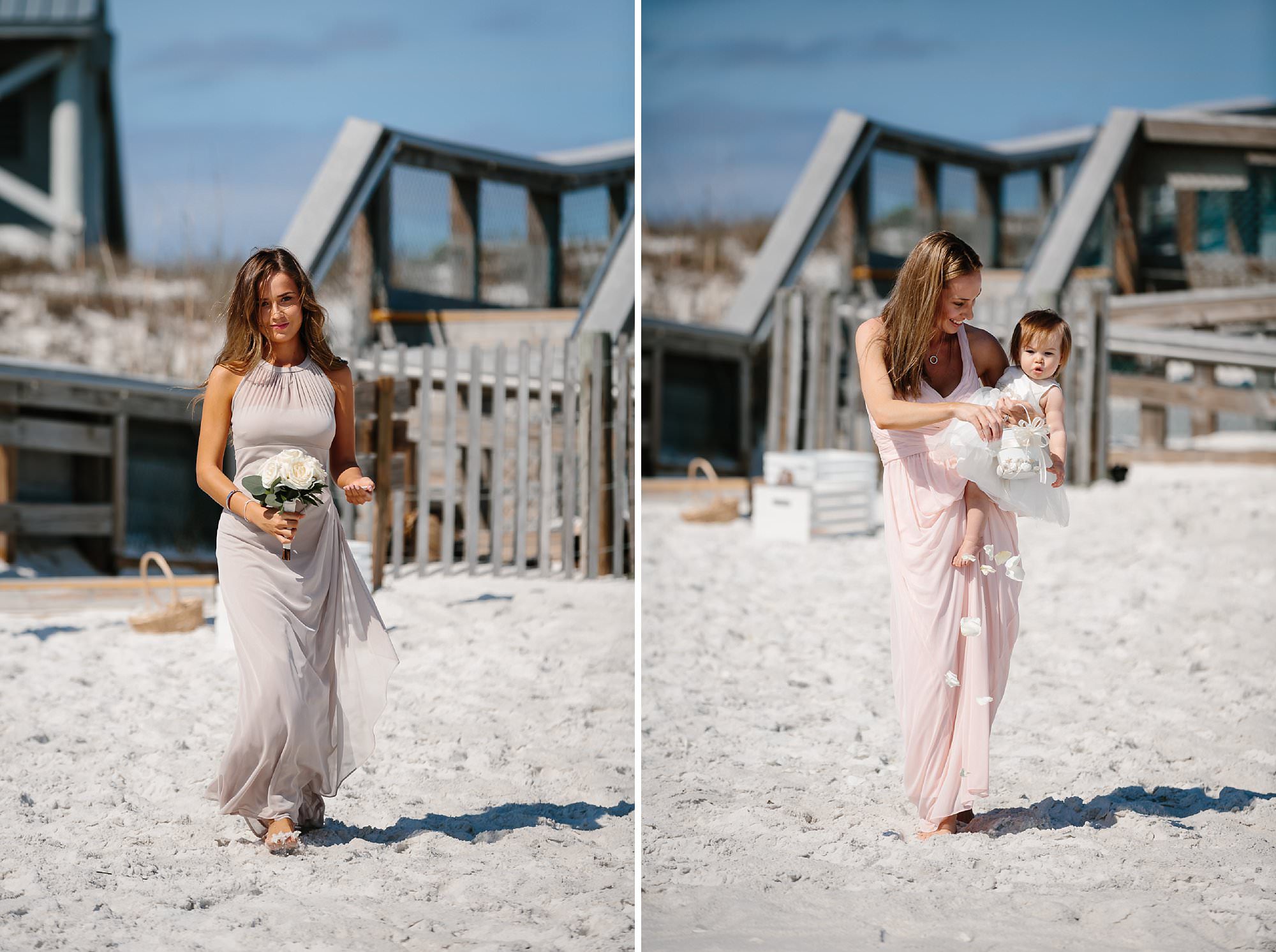 Maid of Honor in sleeves ankle length taupe dress and bridesmaid in full length light pink halter dress carrying flower girl