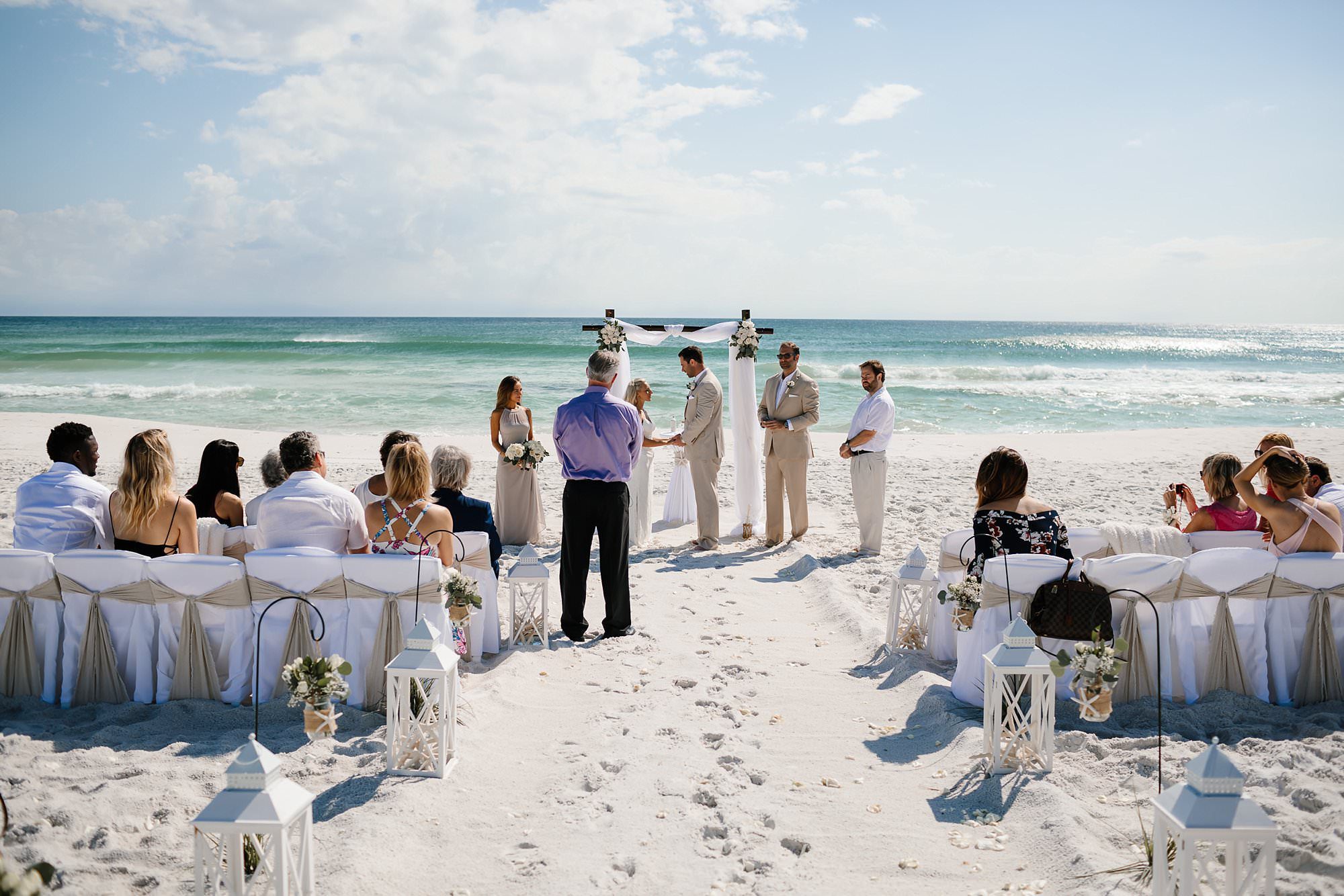 View of intimate wedding ceremony in front of Gulf of Mexico