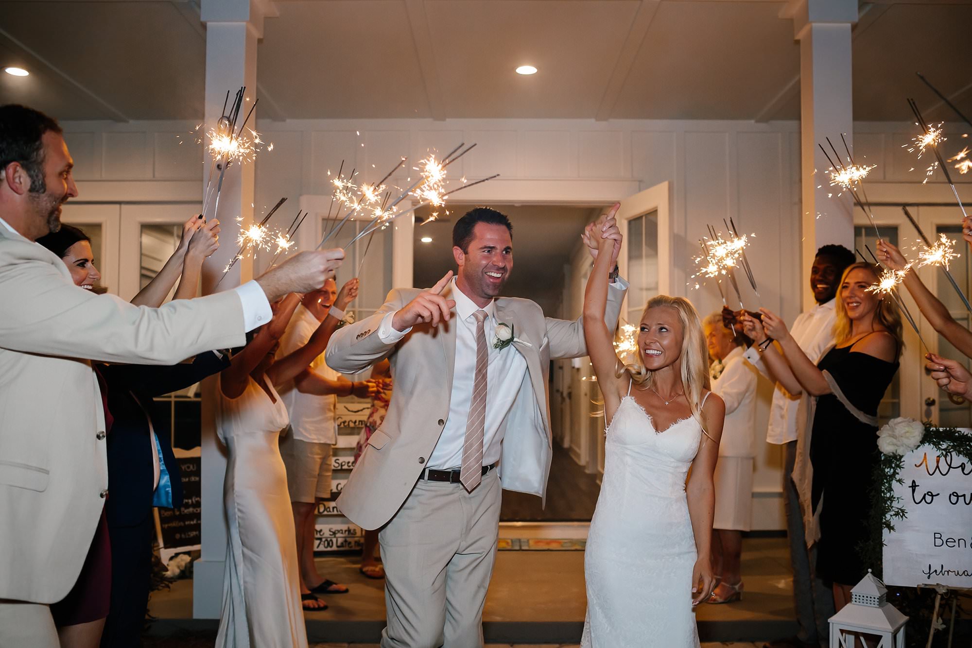 Bride and groom sparkler exit in front of beach house Destin Florida