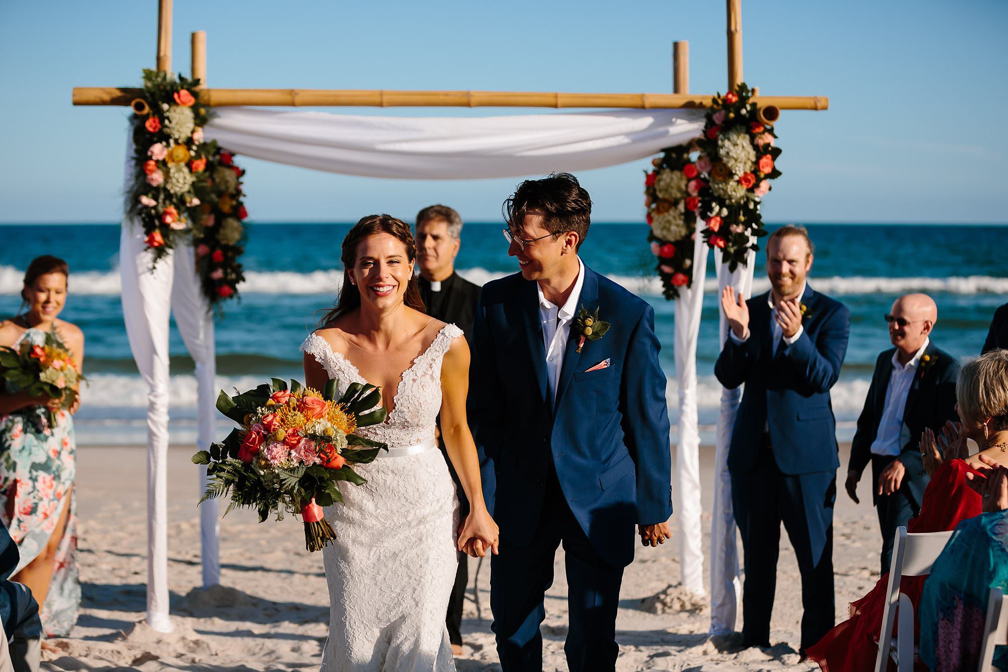 Bride and groom recessional at beach ceremony on St George Island Fl