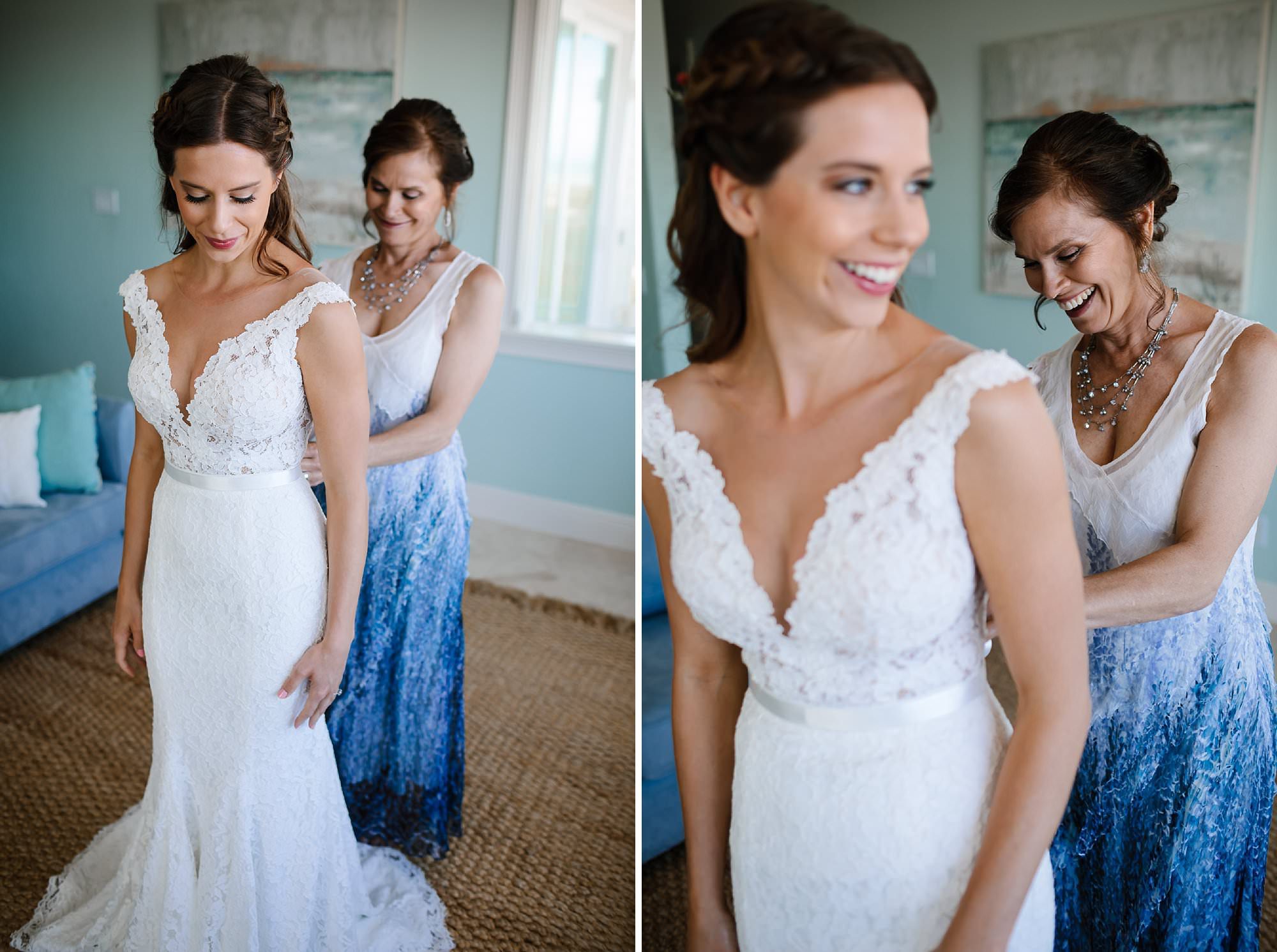 Mother of bride zipping up wedding gown