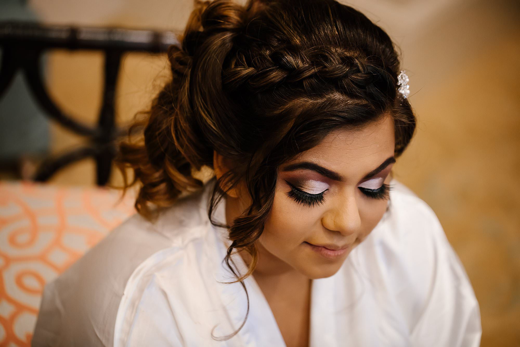 Close up of bride getting her hair done