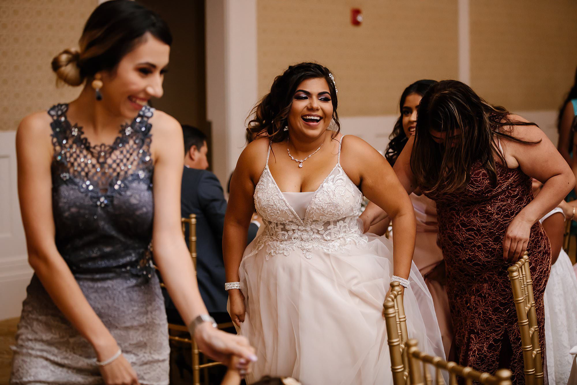 Brides conga line during reception