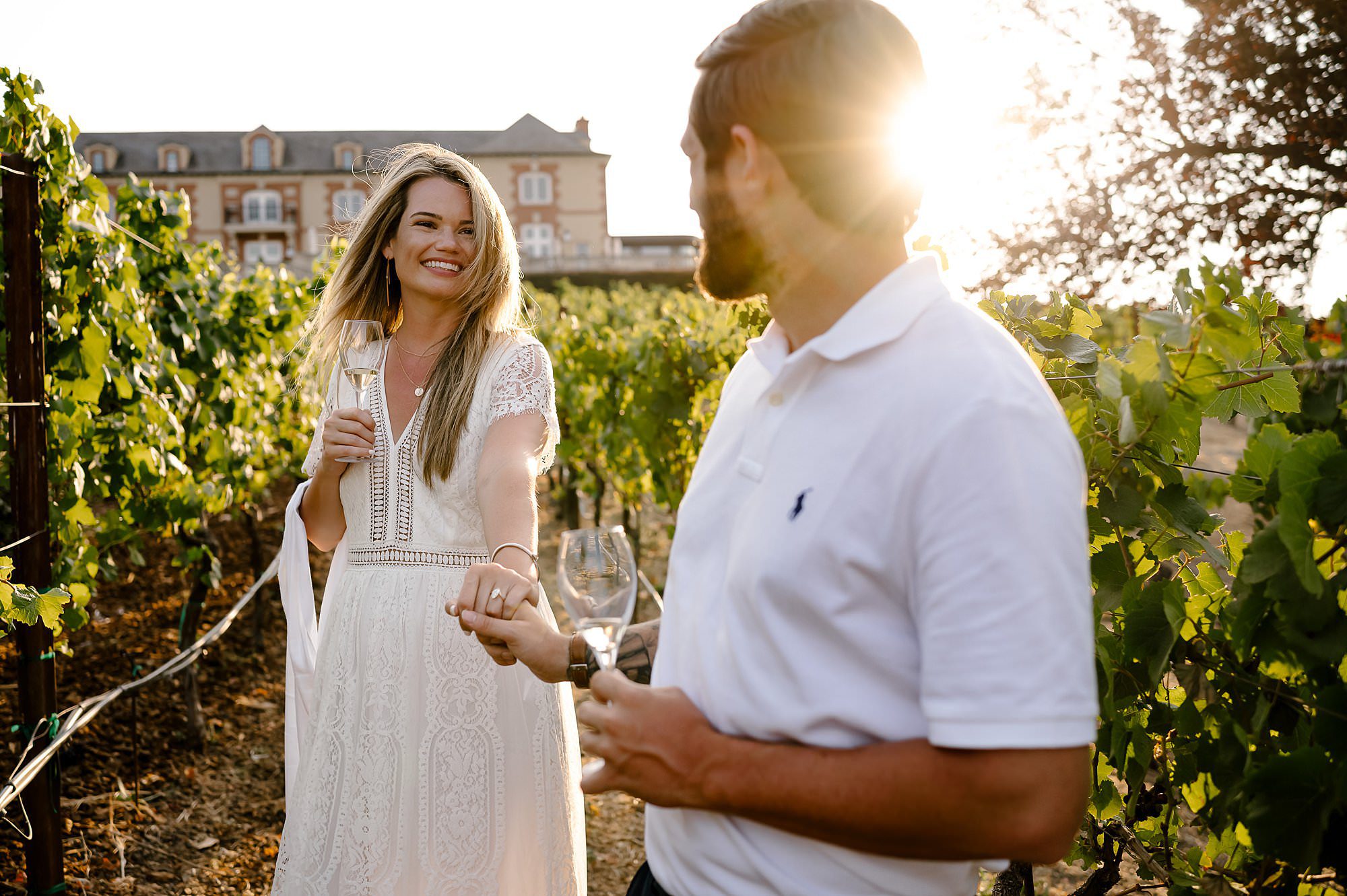 Cameron leads Melissa through the vineyard at Domaine Carneros