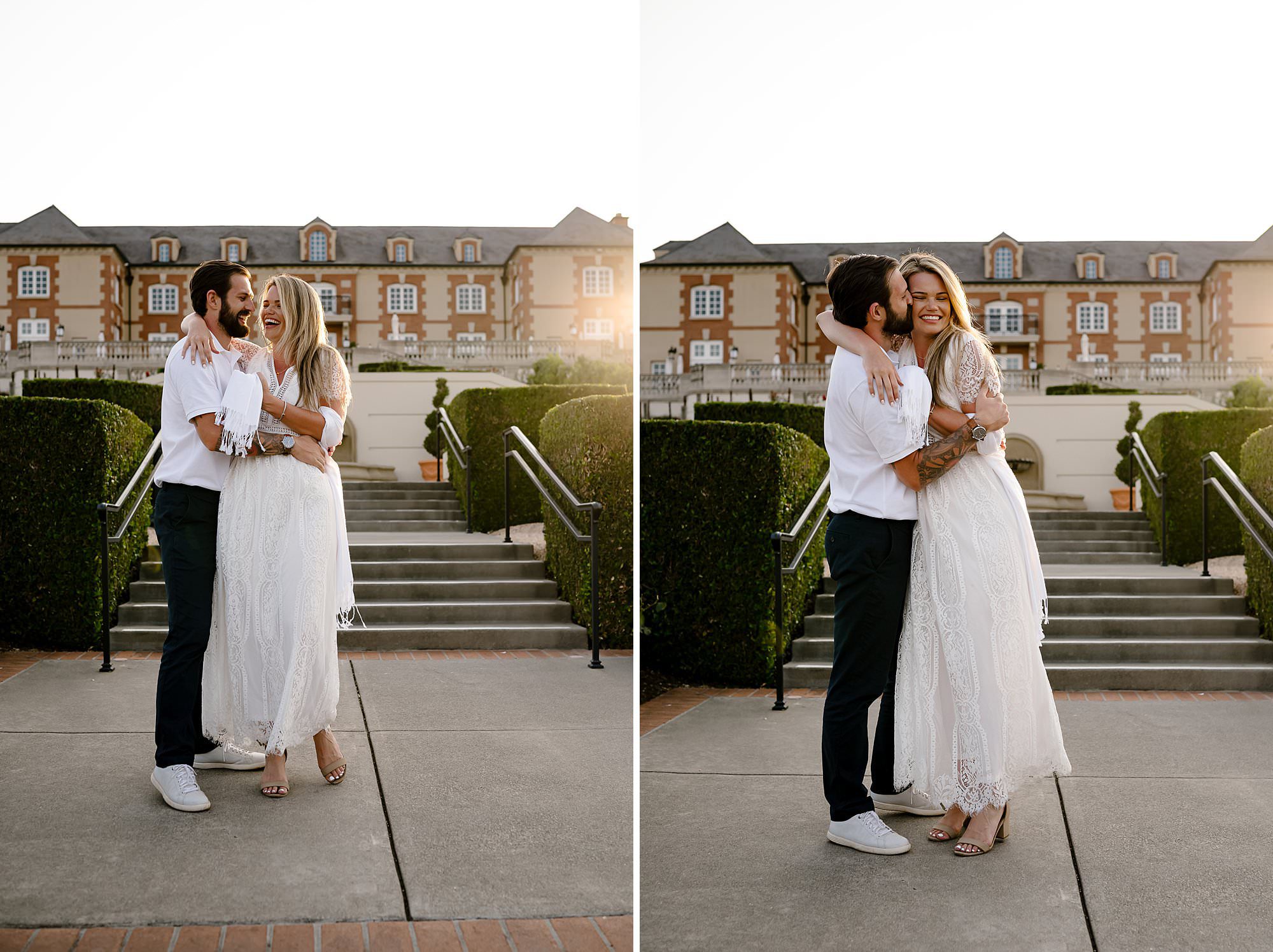 Cameron and Melissa on the steps in front of Domaine Carneros during sunset. 