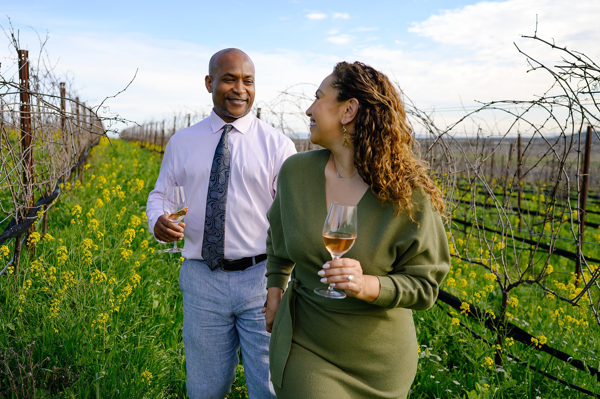Samar leading Courtney in the vineyard at Ram's Gate winery in Sonoma CA