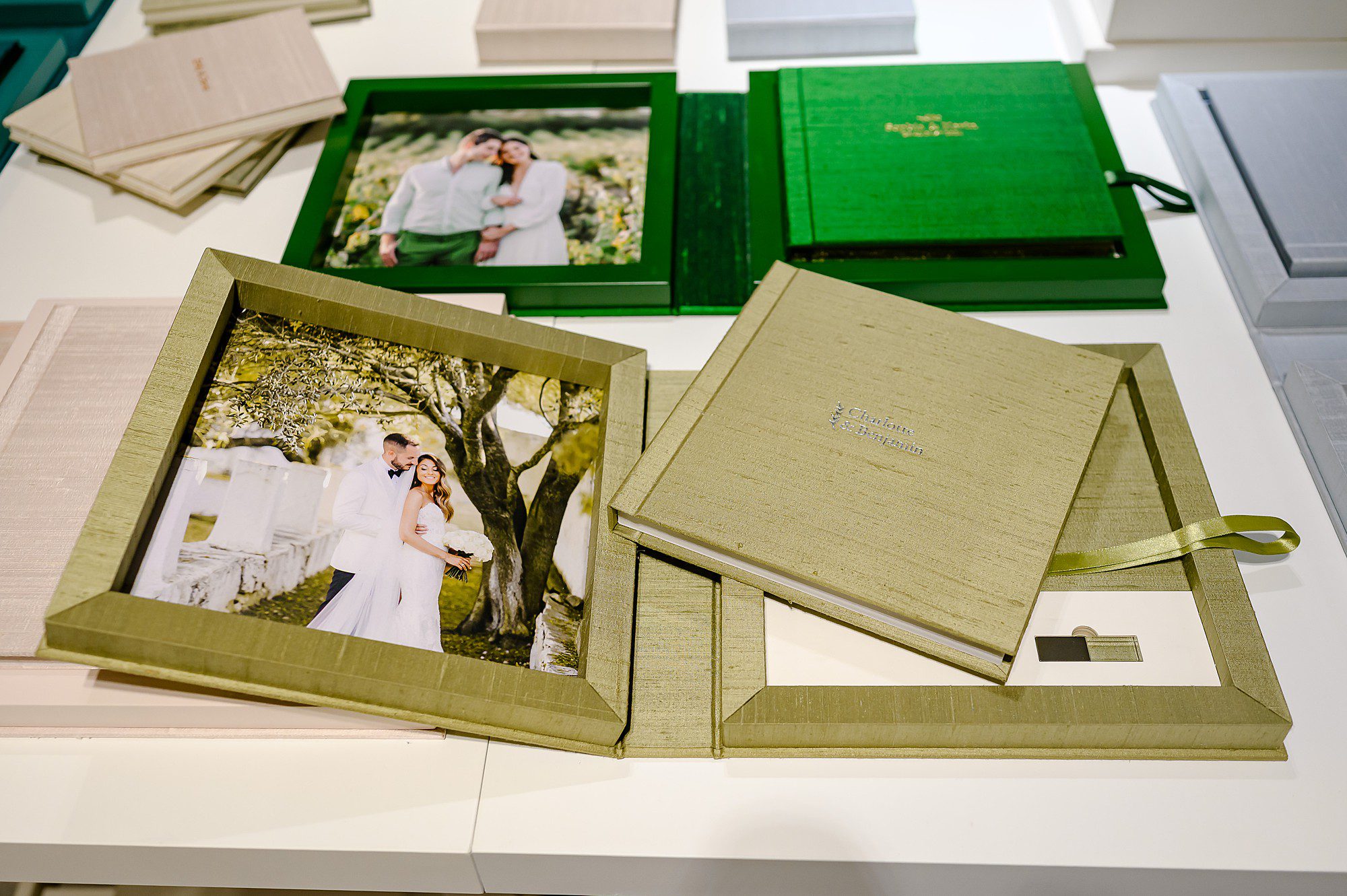 Green silk handmade bespoke wedding albums made by Art Point in Thessaloniki, Greece