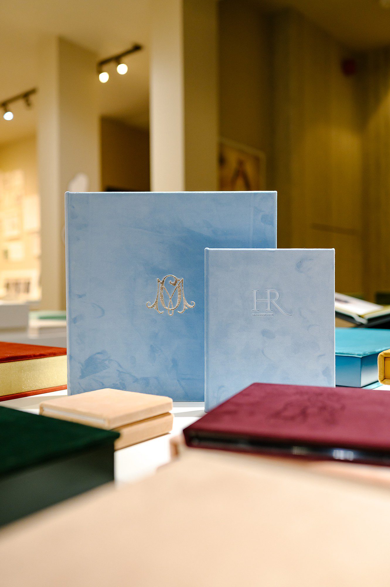 Light blue velvet handmade bespoke wedding albums made by Art Point in Thessaloniki, Greece