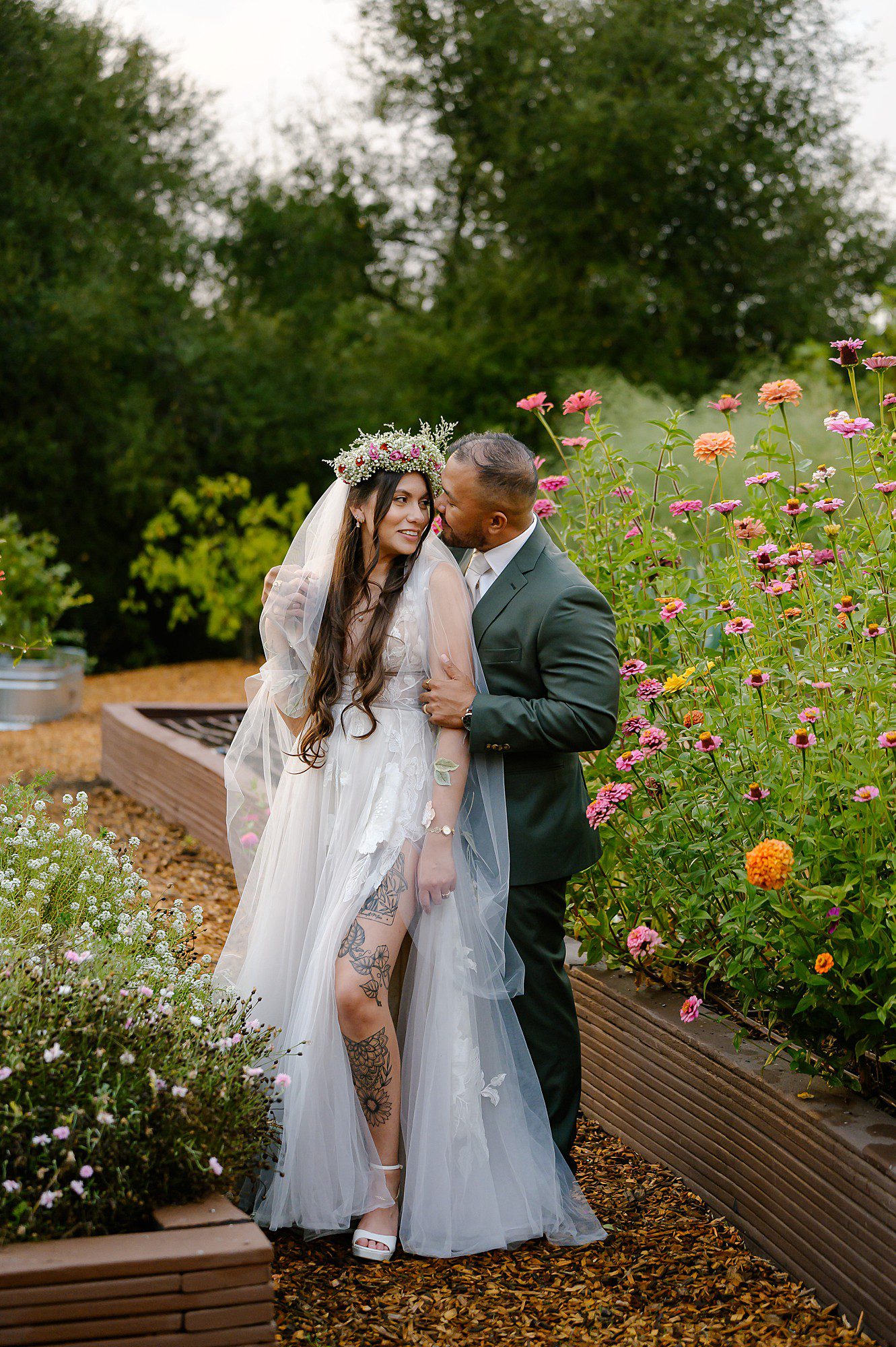 Kat and Kevin in the gardens at sunset after their wedding at Mountain House Estate in Cloverdale CA
