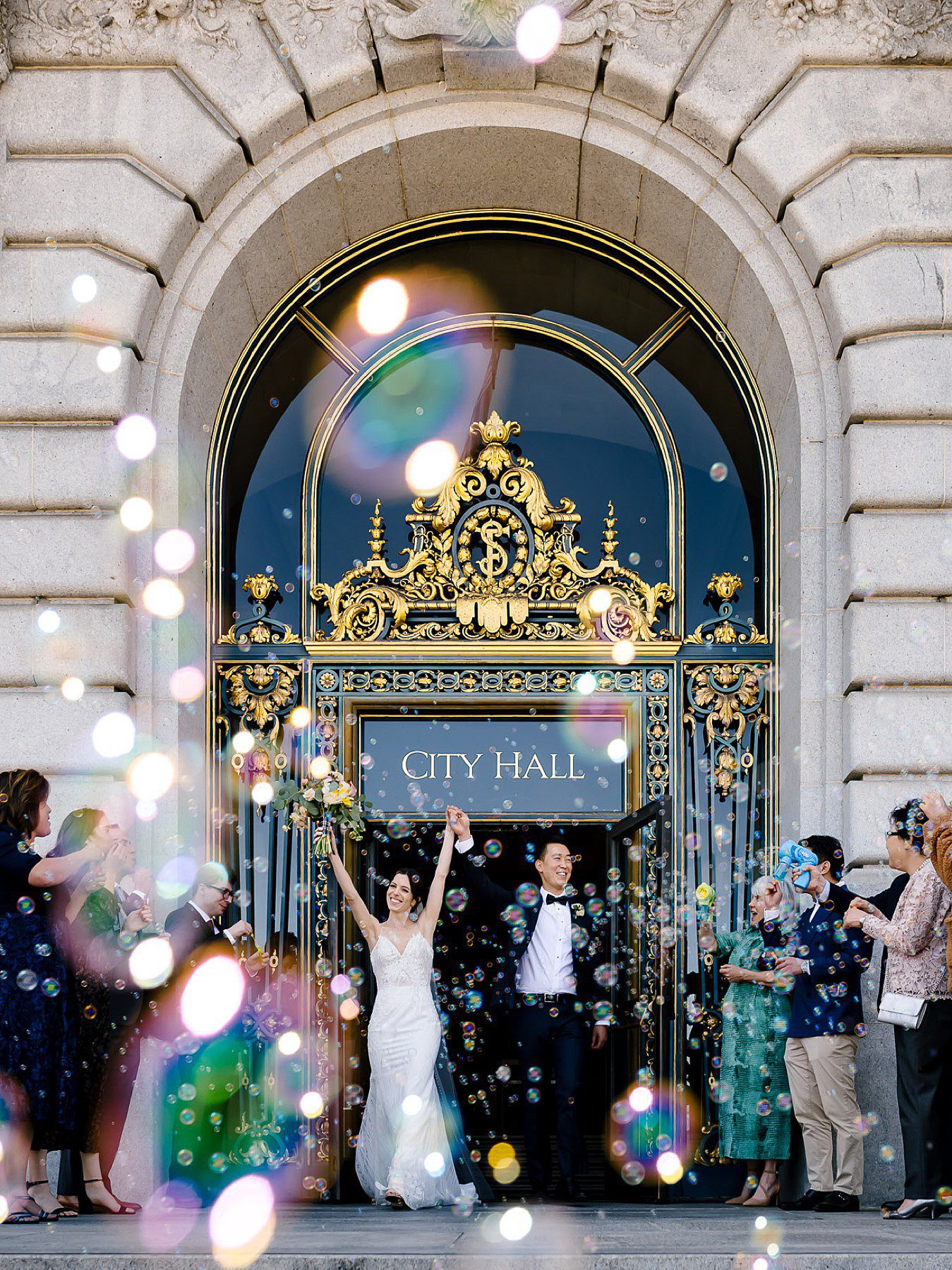 Wedding recessional bubble exit outside of San Francisco City Hall